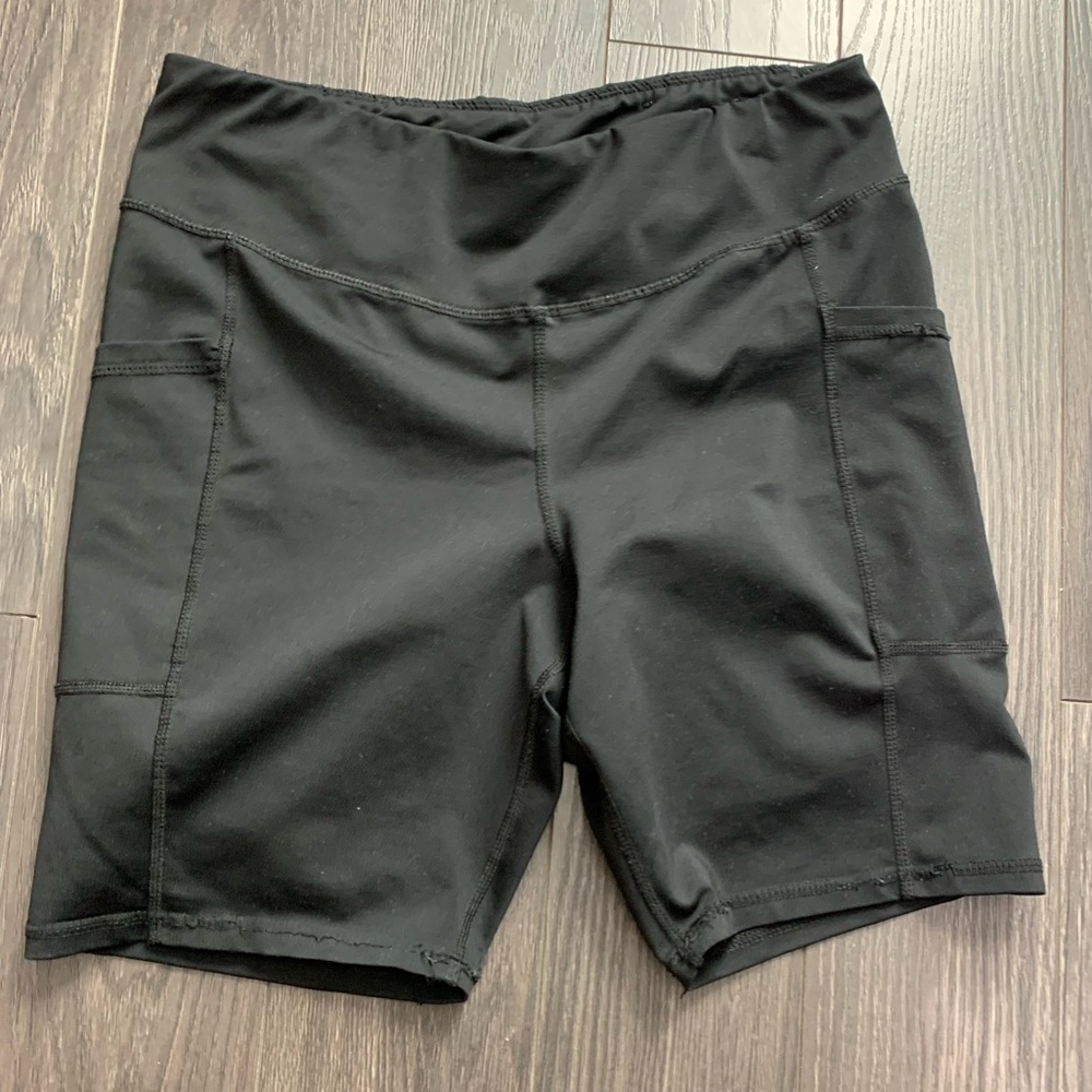 Champion black biker shorts with pockets.